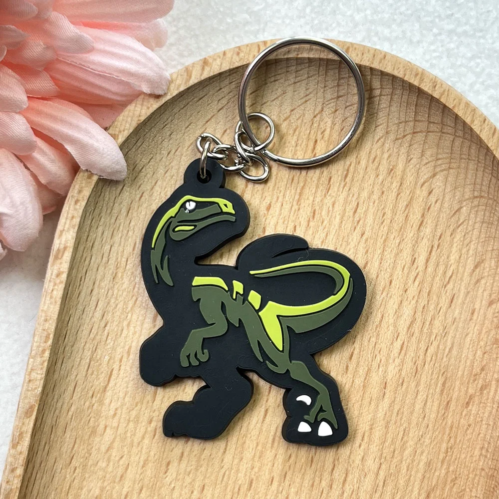 Vastgifts Manufacturer Wholesale Custom Black Dinosaur PVC Rubber Keychains 2D single-sided Printing Keyring