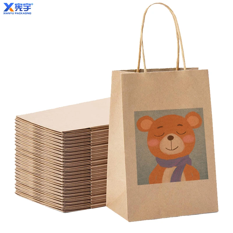 Custom logo 100pcs kraft paper shopping gift bag with handle party gift bag Clothing Packaging Shopping bag Gravure Printing