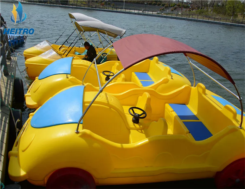 China manufacturer water pedal boat floating big car boat by pedal or electric motor for 5persons with wheels