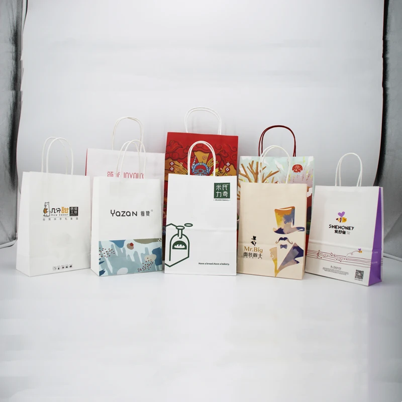 Customized printing eco friendly boutique retail gift party fashion shopping kraft paper tote handbag with cotton rope handles