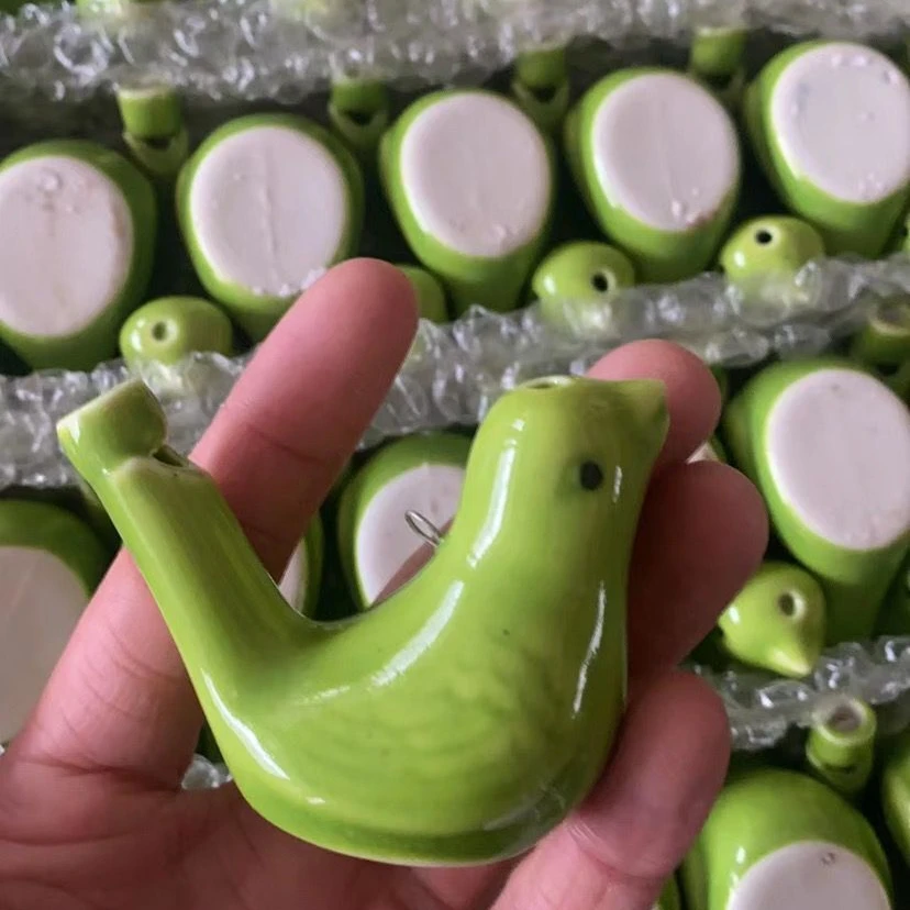 Wholesale cheap solid color bird whistle toy with lanyard omagic clay bird whistle