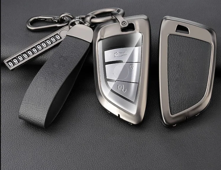 China manufacturer wholesale zinc alloy leather car key holder protector cover case with logo