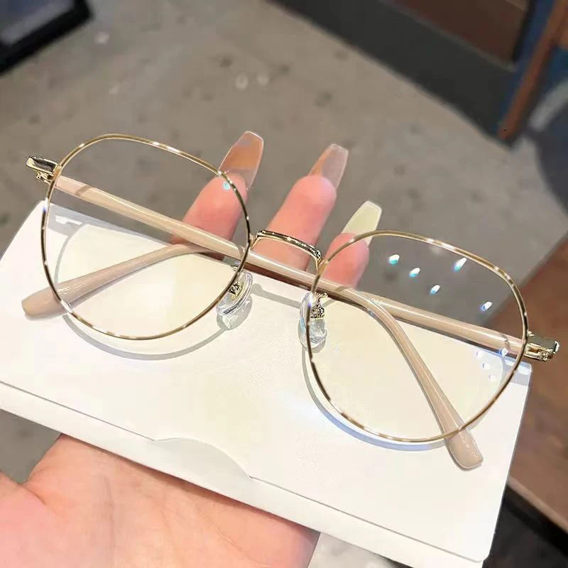 Hot selling Metal anti-blue light glasses fashion round frame men and women simple flat light mirror optical eye glasses frame