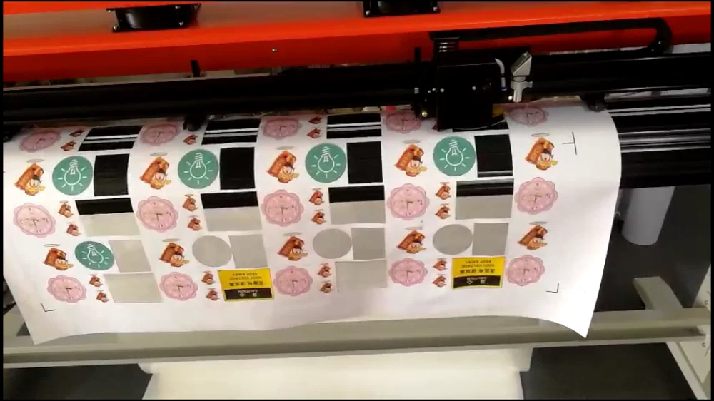 cheap  laser cutting machine cutting logo shapes for roll material