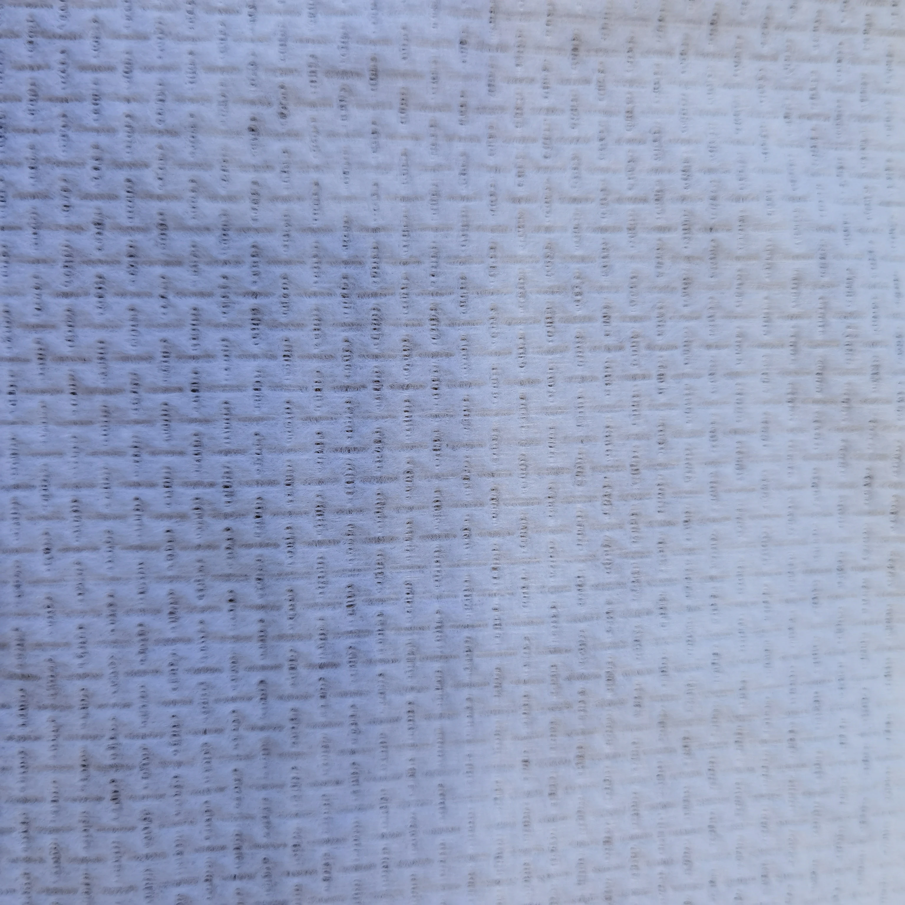 Spunlace Non Woven PP Polyethylene Viscose PET Parallel Cross Emboss Spunlace Nonwoven  Fabric Factory  for Personal Care