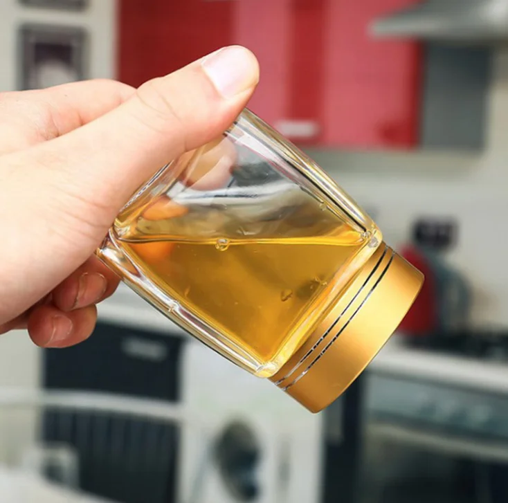 Honey jar with cover can be customized logo honey transparent glass bottle wholesale tomato ketchup manufacturing plant