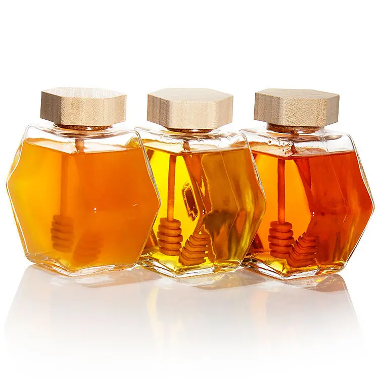 High Quality 100ml 220ml 380ml Transparent Hexagonal Honey Container Glass Jam Honey Jar Jar With Wooden Dipper and Bamboo Cork