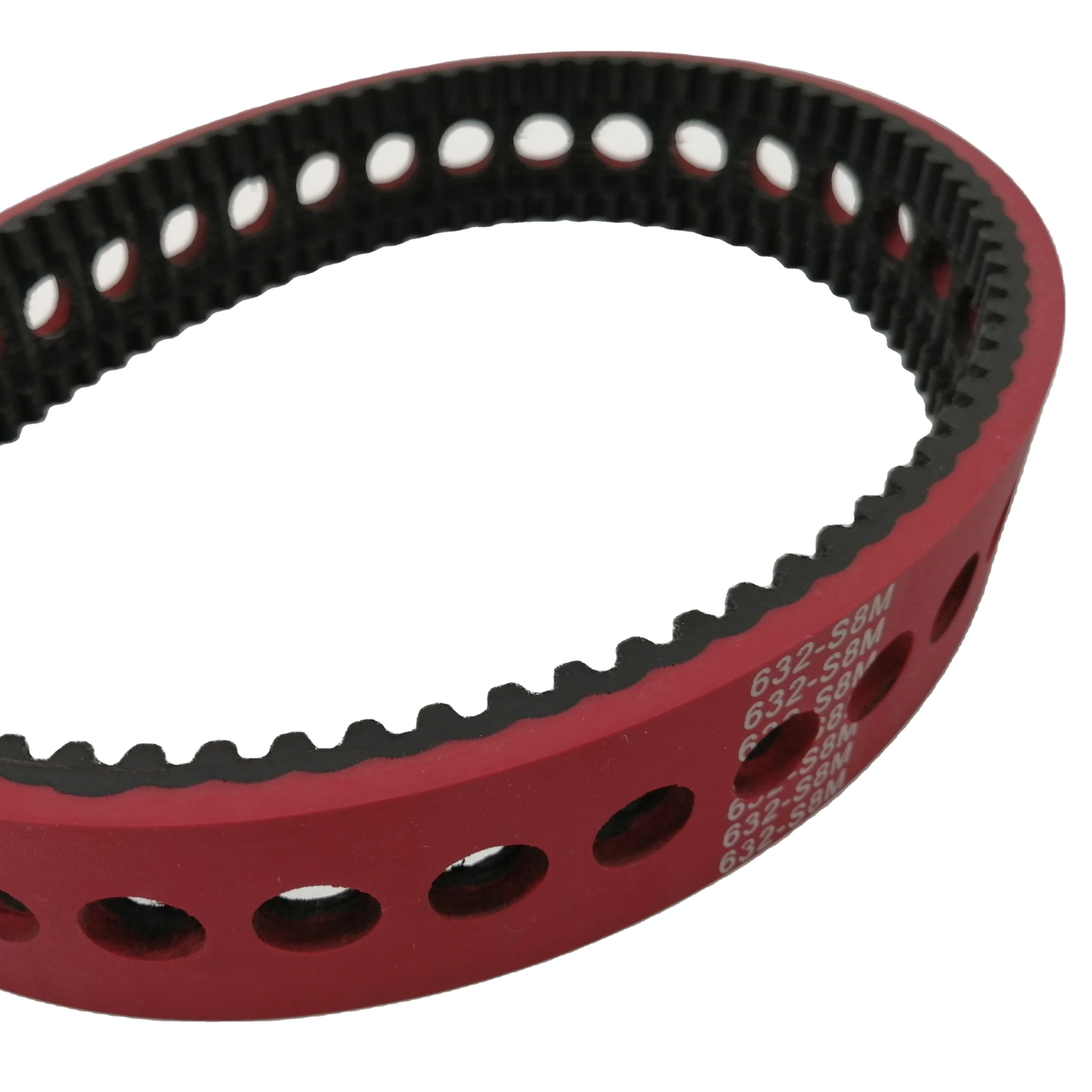 S8M timing belt with cast covering with holes and skived teeth in the center