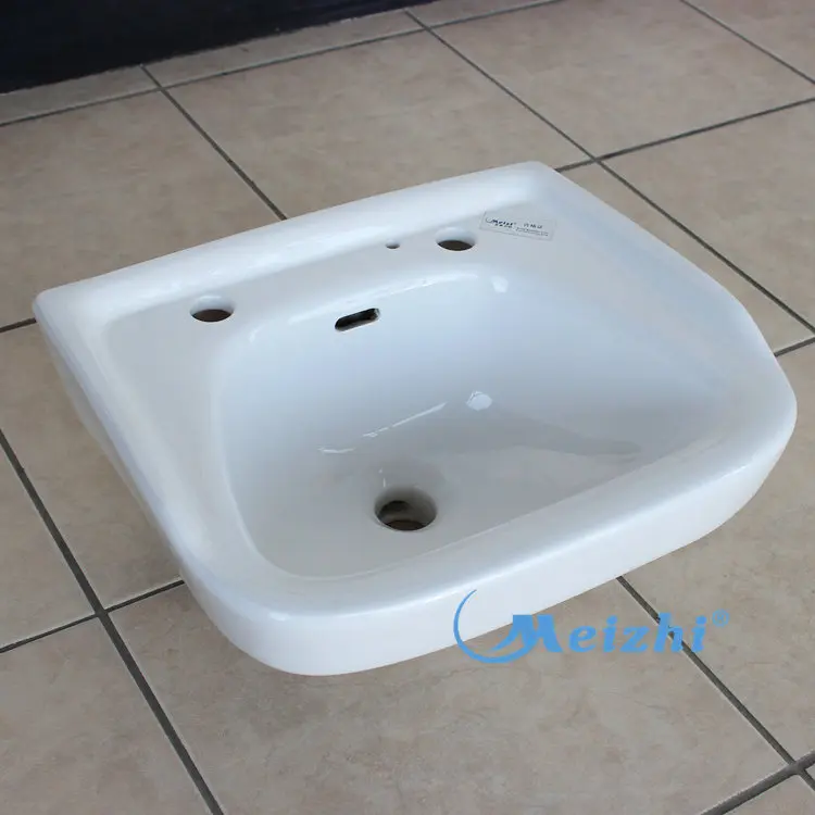 Twyford ceramic wall hung bathroom sinks with two faucet holes