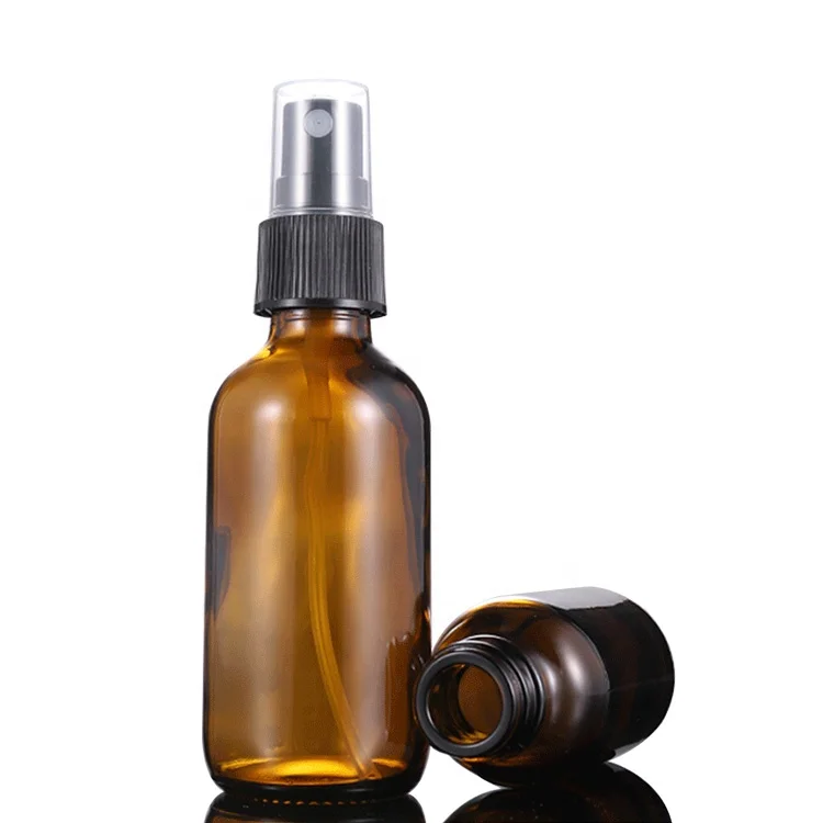 2 oz amber essential oil Cosmetic essence lotion glass spray bottles with plastic spray for cosmetics