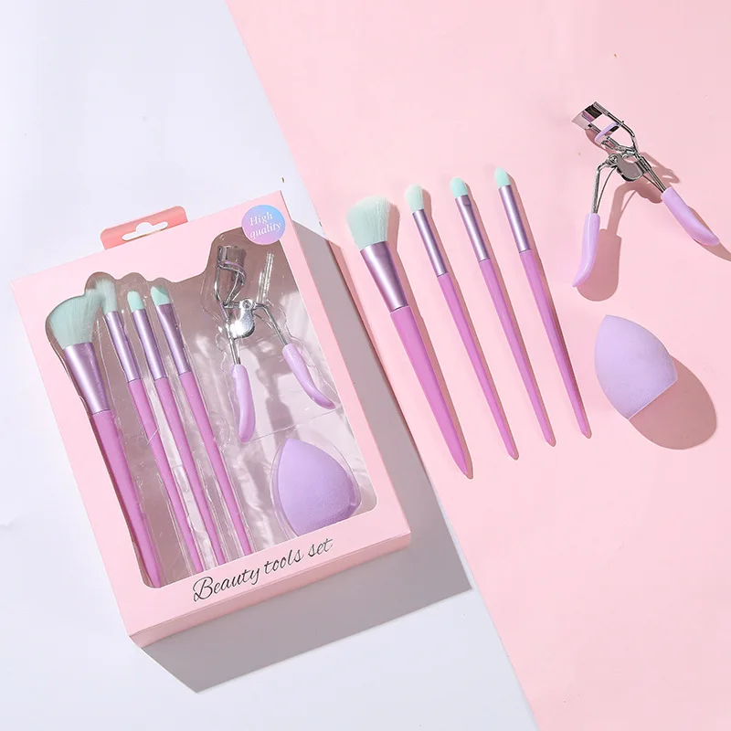 Makeup tool brush 4 pieces brush 1 eyelash curler 1 powder puff makeup brushes set in box