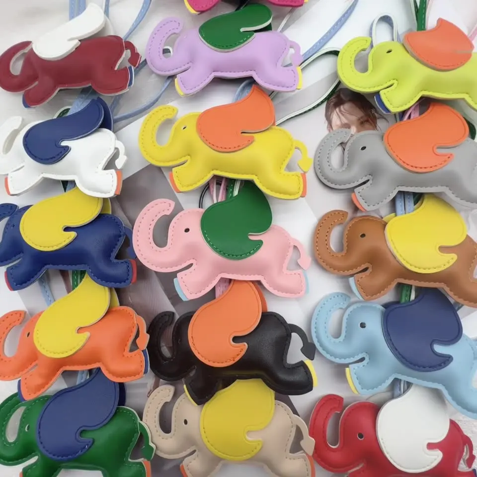 Cute pu leather animal keychain leather horse keychain leather lucky elephant cow horse pendant keychain