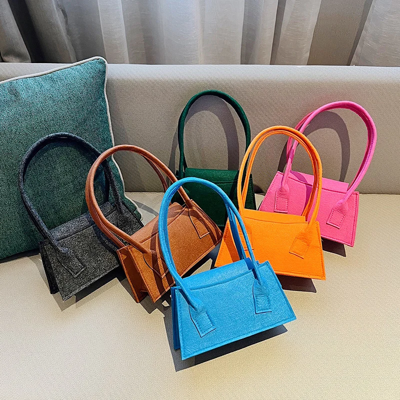 2023 new arrivals yiwu market products felt cloth bags China wholesale Fashion luxury handbag for women cheap flap dust bag