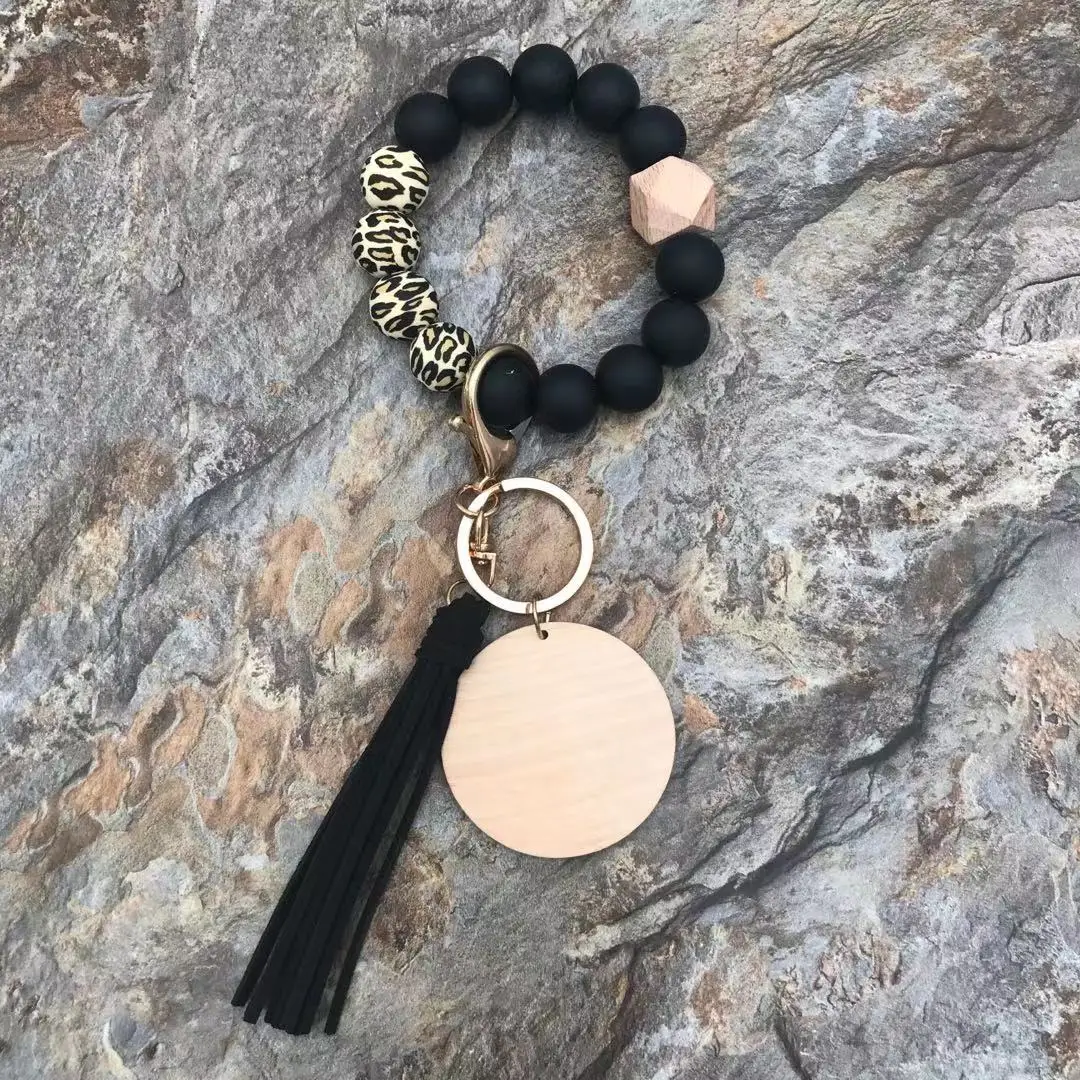 Wholesaler Silicone Bead Bracelet Keychain With A Wooden And Round Wood