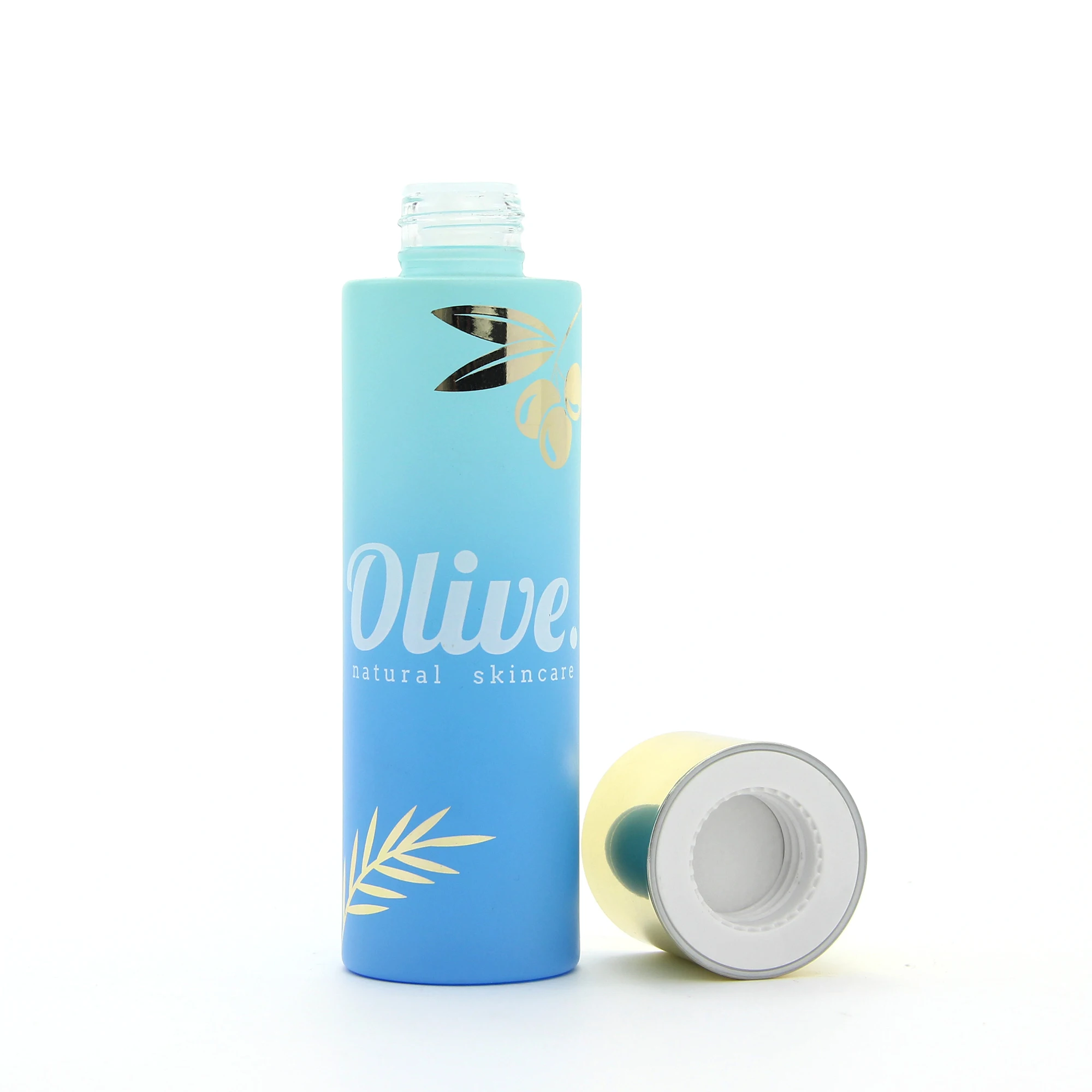 Colorful green blue empty facial toner glass bottle with gold cover cap and orifice reducer