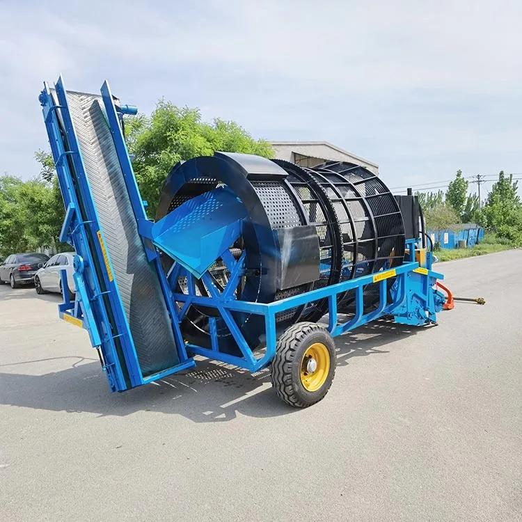 Large stone picker machine collect and recycle debris and clear land and open up wasteland