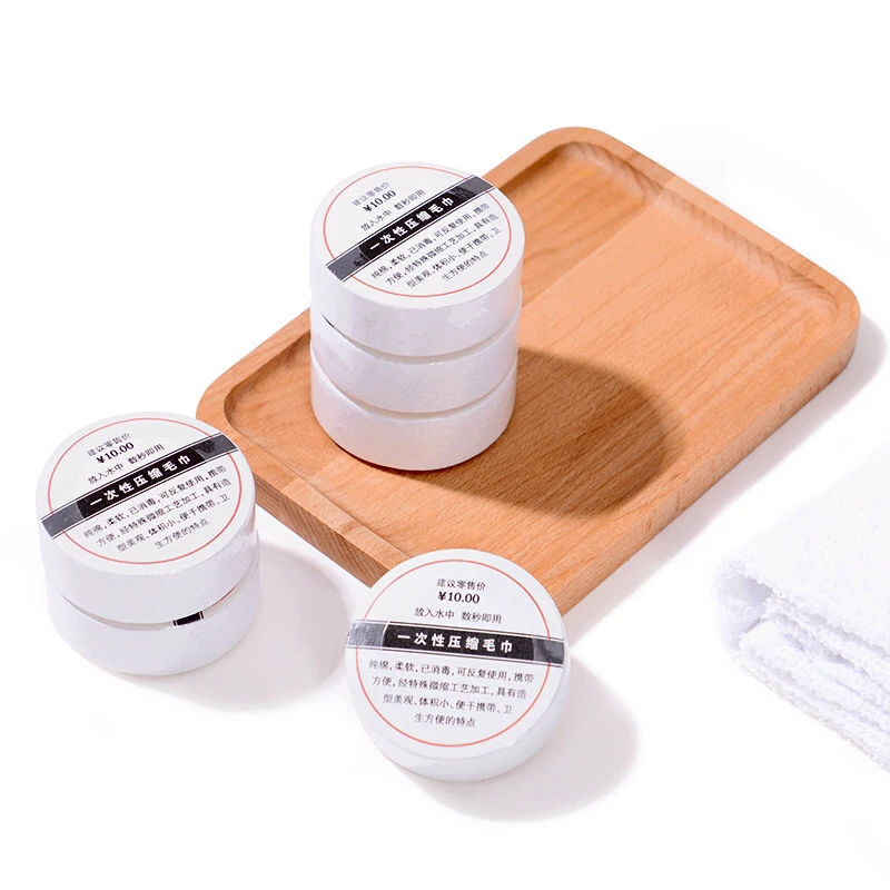 Wholesale Chinese factory compressed disposable hotel travel small towel