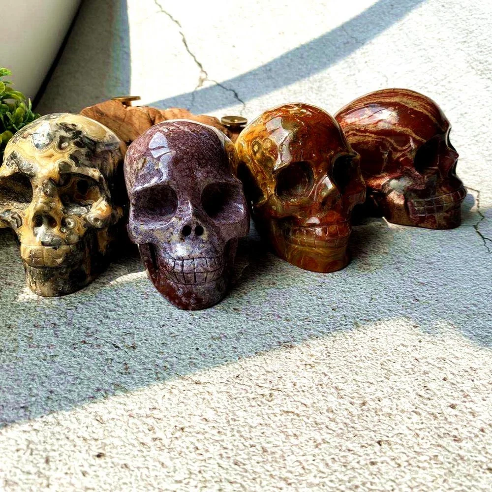 High quality hand carved natural crystal skull art sculpture folk crafts rainbow jasper skull for decoration