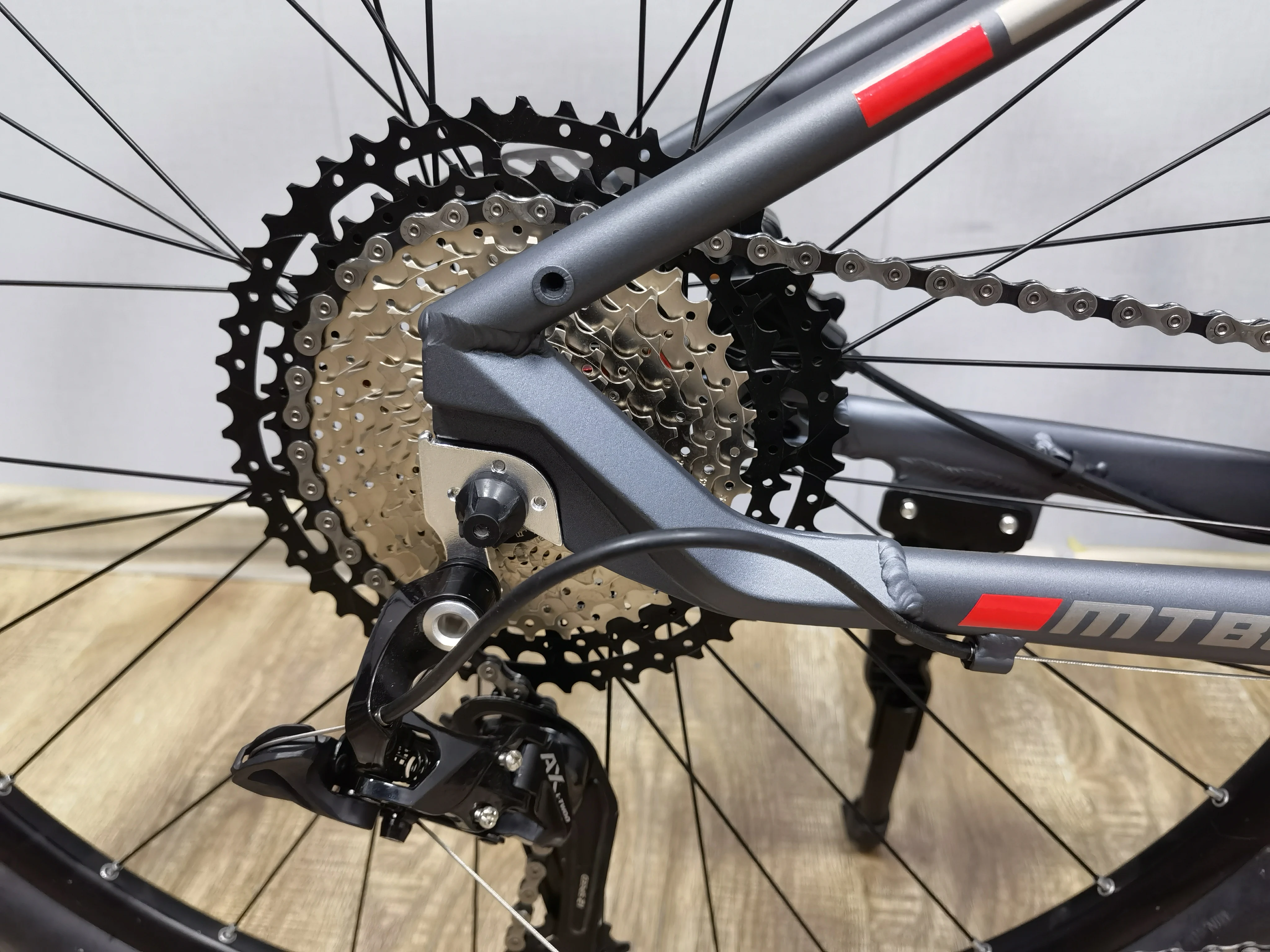 2023 MTBGOO High end 27.5 inch spokes wheels hydraulic disc brakes 12 speed suspension front fork mountain bike