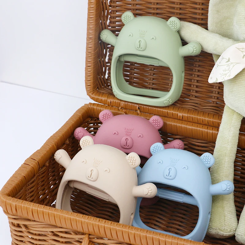 Cute cartoon attractive baby attention silicone grip glove soothing bear pig chick designs silicone teether toys