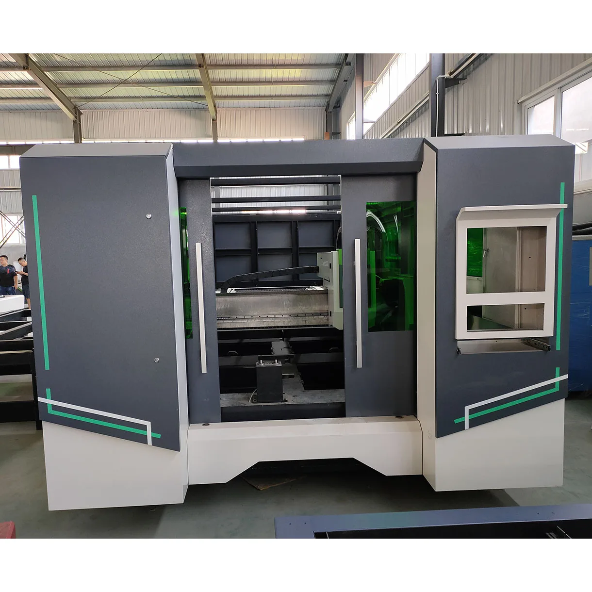 Fiber laser cutting machine with exchange table for metal working industry