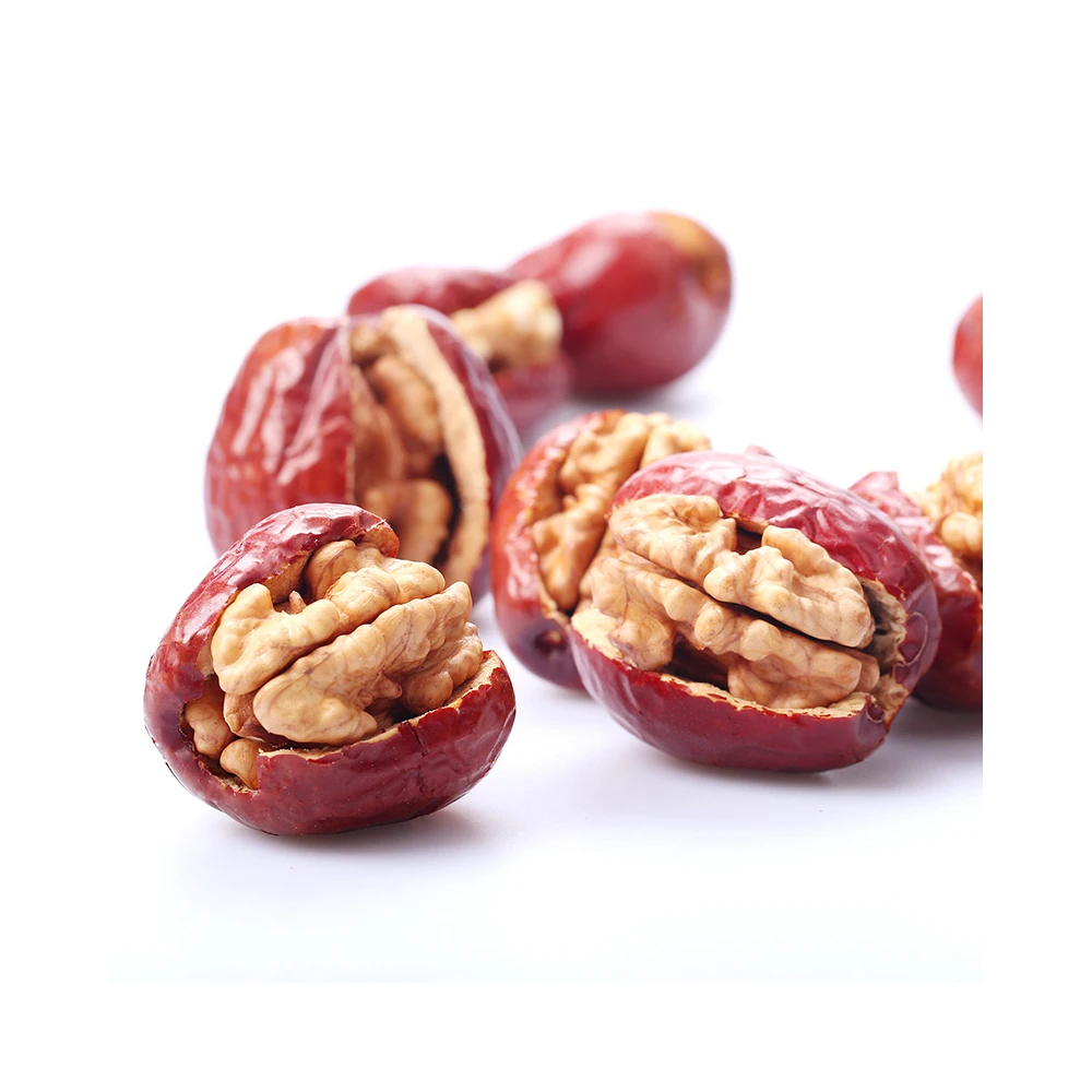 Handmade walnut kernels and red dates for producing nut snacks