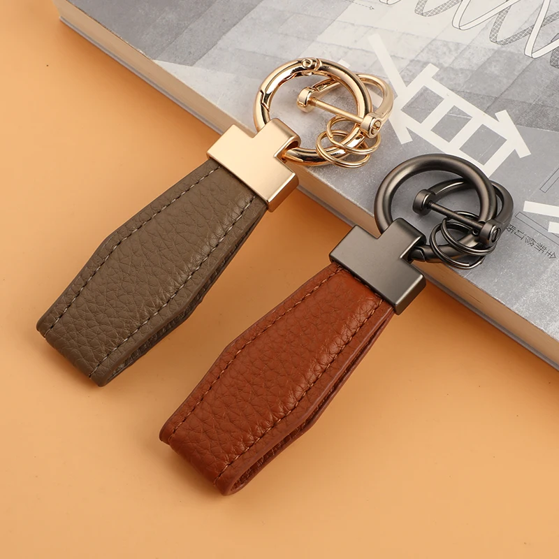 High Quality Factory Custom Wholesale Leather Car Logo Metal Embossed Keychain Zinc Alloy Keychain