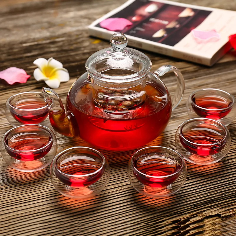 
Borosilicate Gongfu Tea Flowering Glass Teapot Set with 6 cups and pot warmer 
