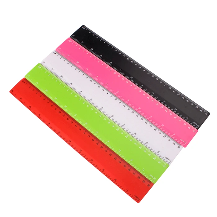 A four-piece set of student stationery contains a 15cm ruler, a 45-degree triangle, and a 60-degree triangle protractor