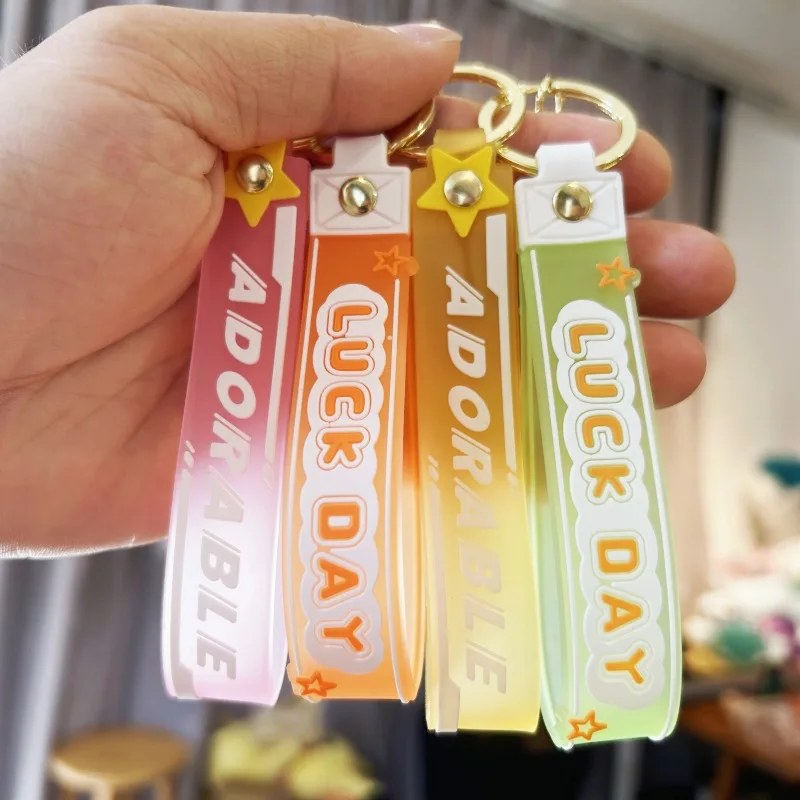 New creative cartoon cross dressing hoodie small yellow keychain PVC rubber pendant doll student backpack pendant accessories