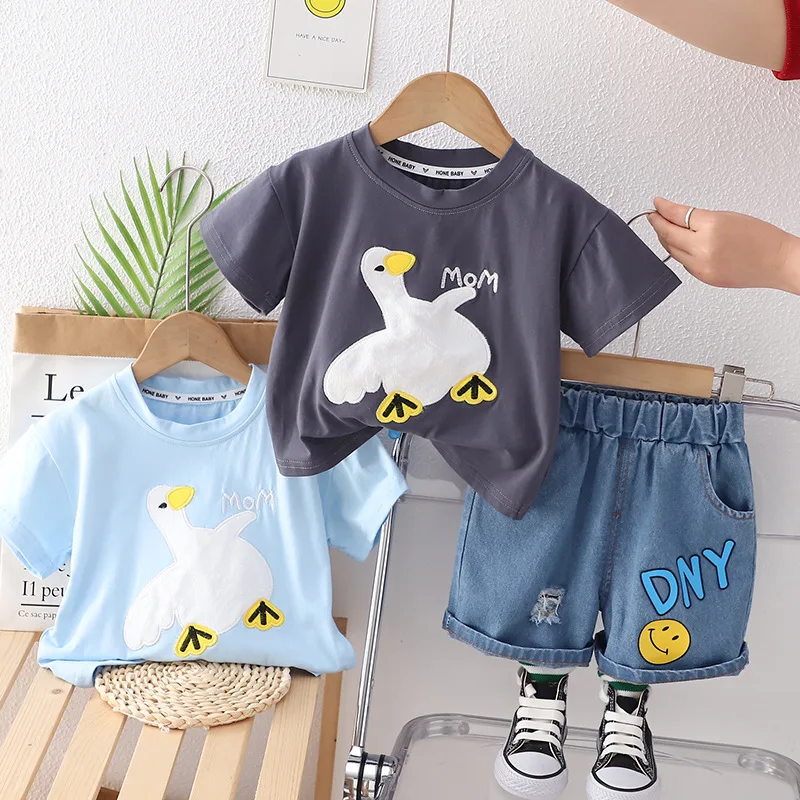 Clothing factory wholesale 2024 high quality fashion cartoon printed round neck children short sleeve and shorts two sets