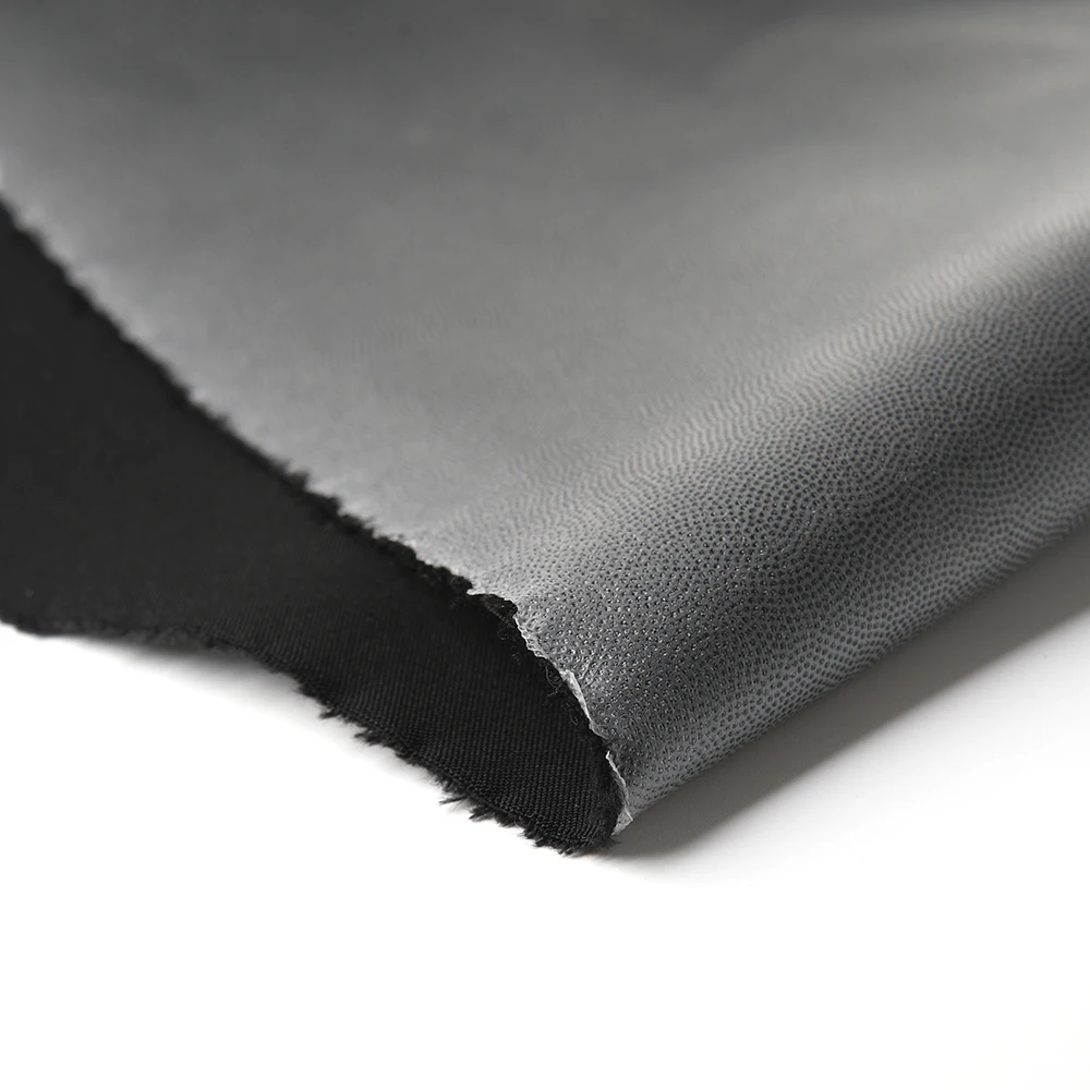 Windproof Breathable Bonded Softshell Fabric Waterproof Woven 100% Polyester 150D Plain Customizable 137 Gsm