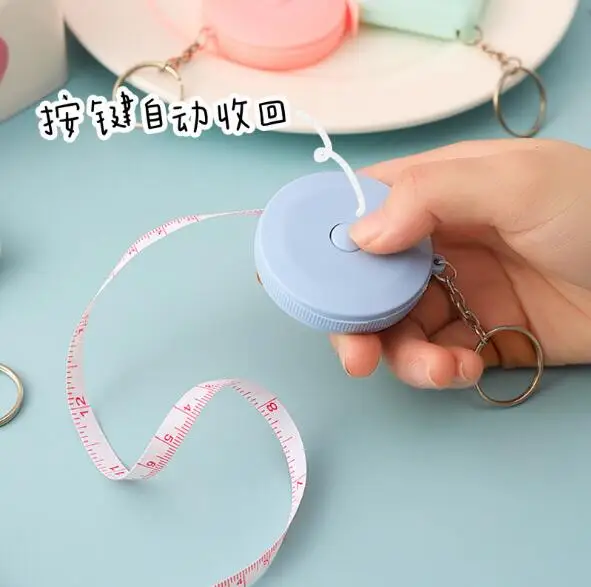 Custom Mini Pink Round PVC Portable Retractable 1.5 M tape measure keychain