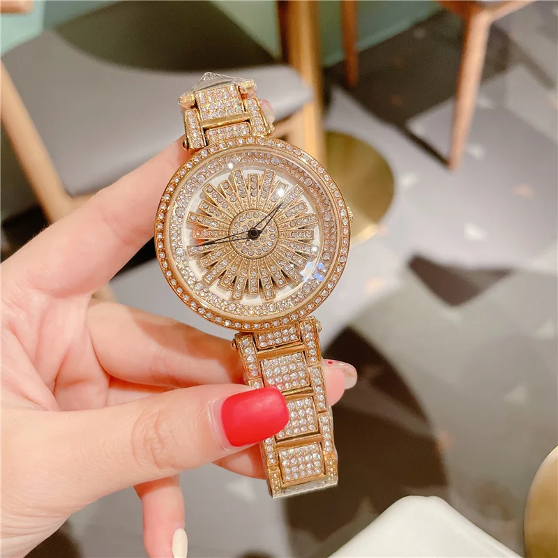 Exquisite Cute Rotating Purple Diamond Large Surface Ladies Wrist Watches Elegant Nigeria Waterproof Gold Quartz Watch For Women