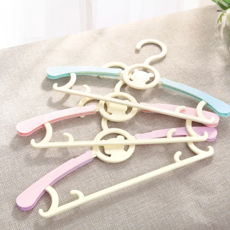 Wholesale Factory Groove Design Scalable Heavy-Duty Plastic Baby Clothing Hangers for Baby Children Kids