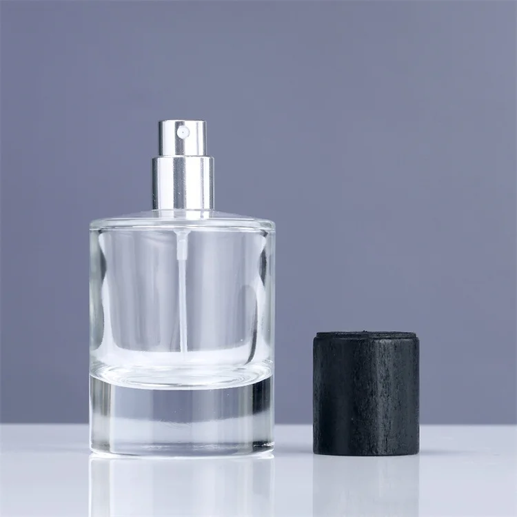 cheap magnetic lids 30ml 33ml 35ml cylinder glass perfume packaging bottle high gloss black with magnet cap india