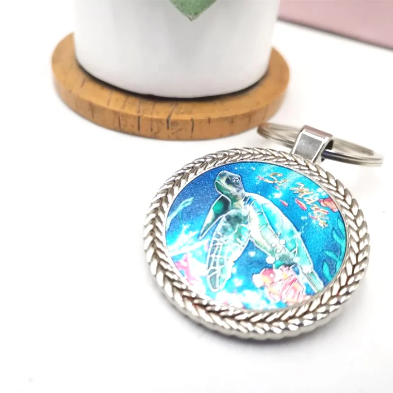 High quantity Hot Sale Custom design key Chains round shape zinc alloy blank  with epoxy foil Metal Keychain for souvenir gifts