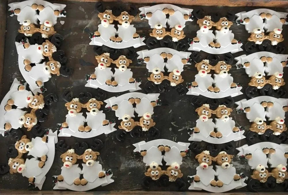 Рождественские украшения в виде семьи оленей