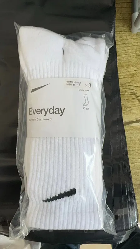 Bulk wholesale 6pack cushion cotton sport socks custom logo basketball long athletic socks for men