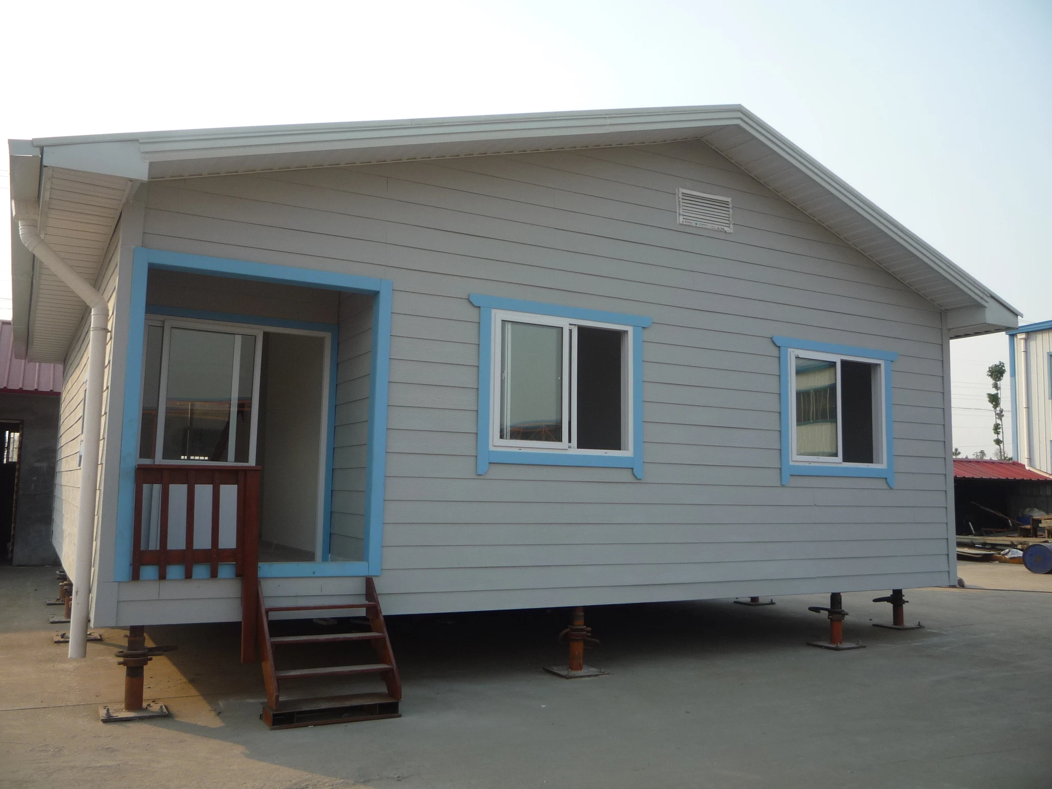 Easy assemble Chinese cheap light weight steel prefabricated house sturdy steel structure prefab house
