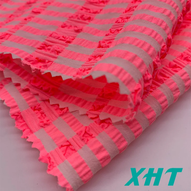Hot selling customized color 4 way stretch woven Jacquard seersucker swimwear fabric