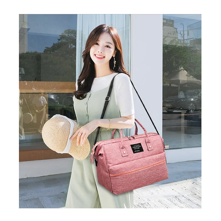 
Good quality large capacity mom travel shoulder diaper bag tote with luggage strap 