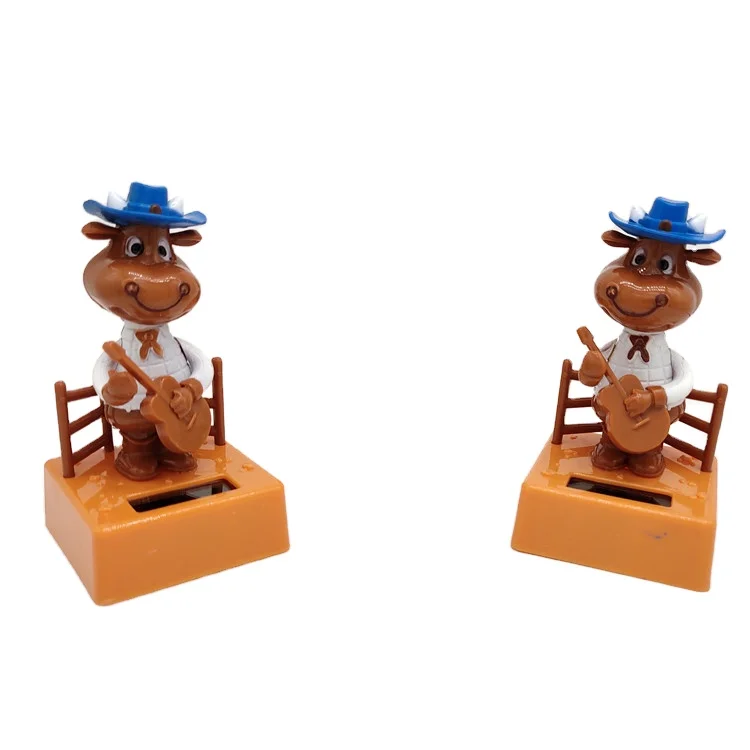 New Design ABS Cow Playing Guitar Bobble Head Shaking Toy Movable Action Figure