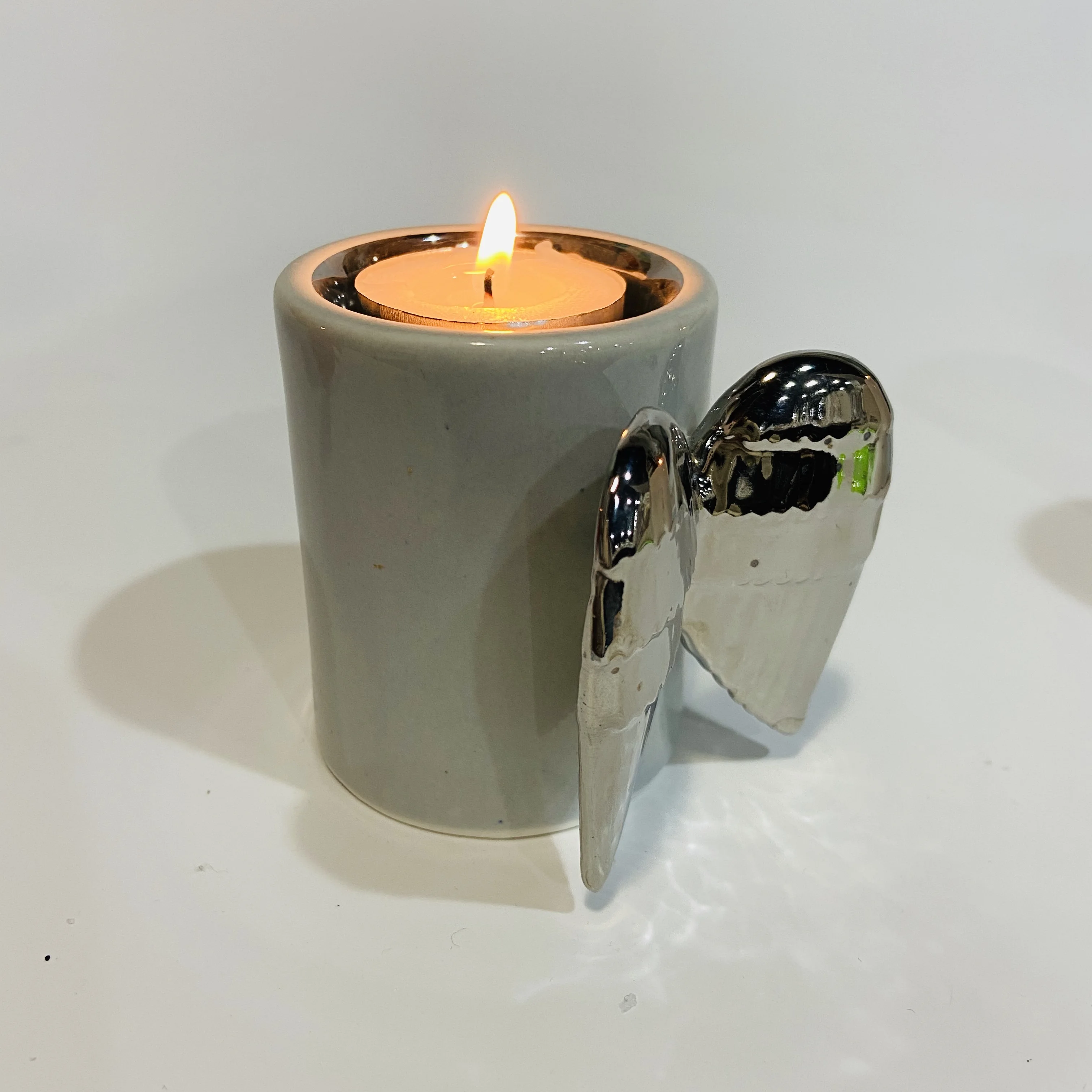 
Best selling angel wings decor ceramic candle cup holder 