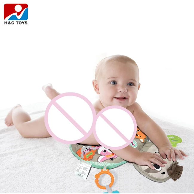 Comfortable soft cartoon animal game lie down pillow toy with rattle baby pillow u shape