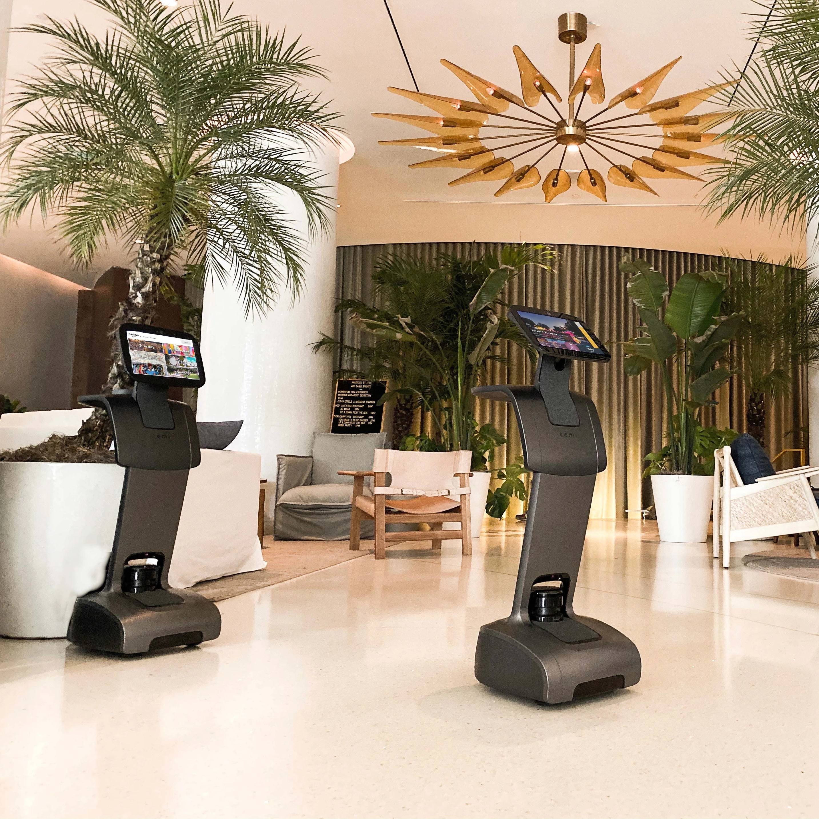 butler and robot hotel concierge telepresence hotel mobile service ai temi robot
