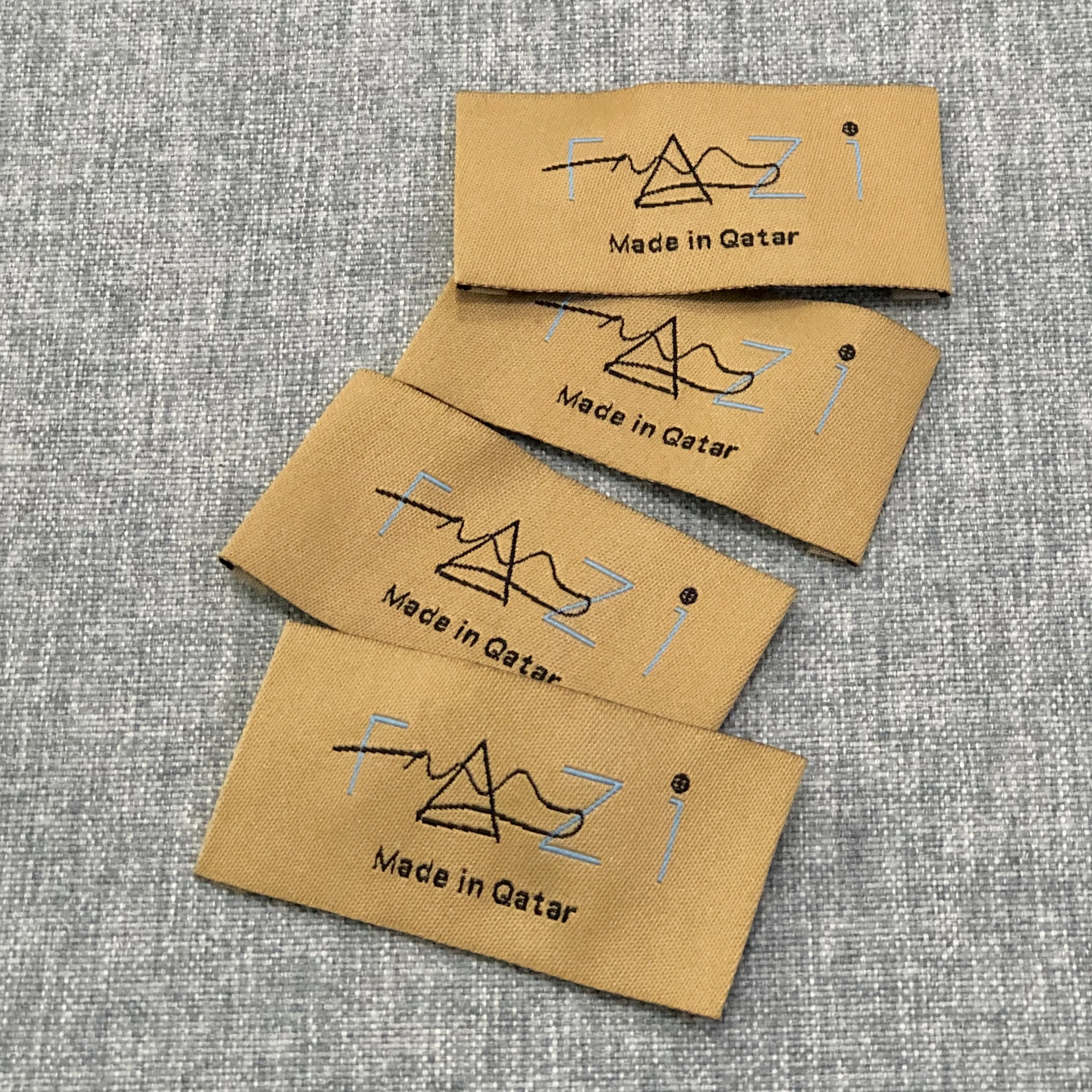 High density fashion design custom logo end fold black label swing on woven care label main tag for clothing socks