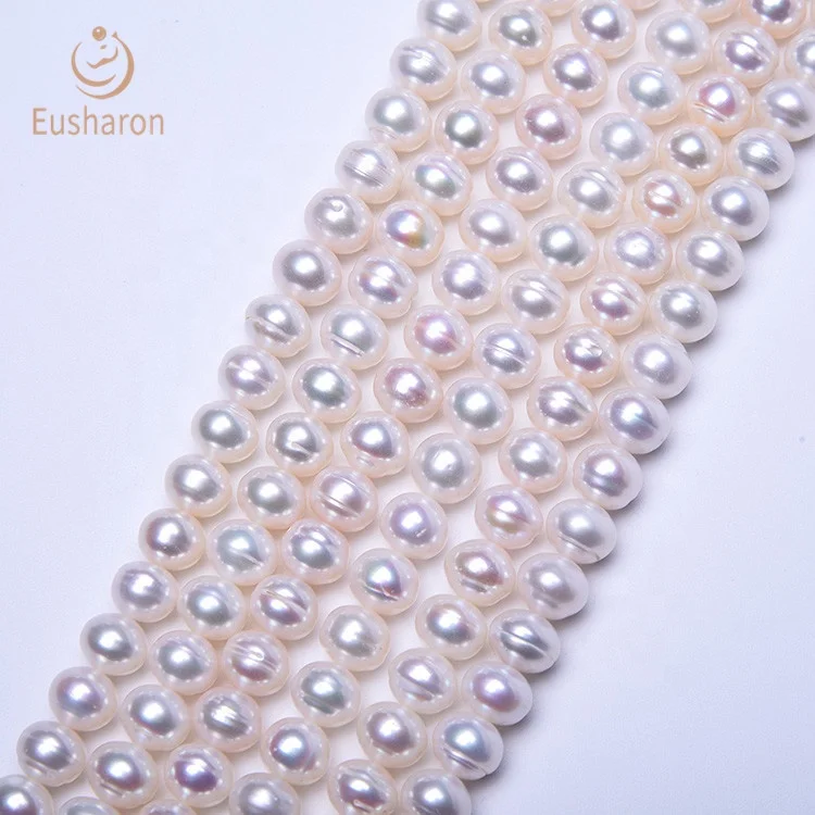 
Wholesale China White Flat Round Cultured Best Selling Fresh Water Pearls 