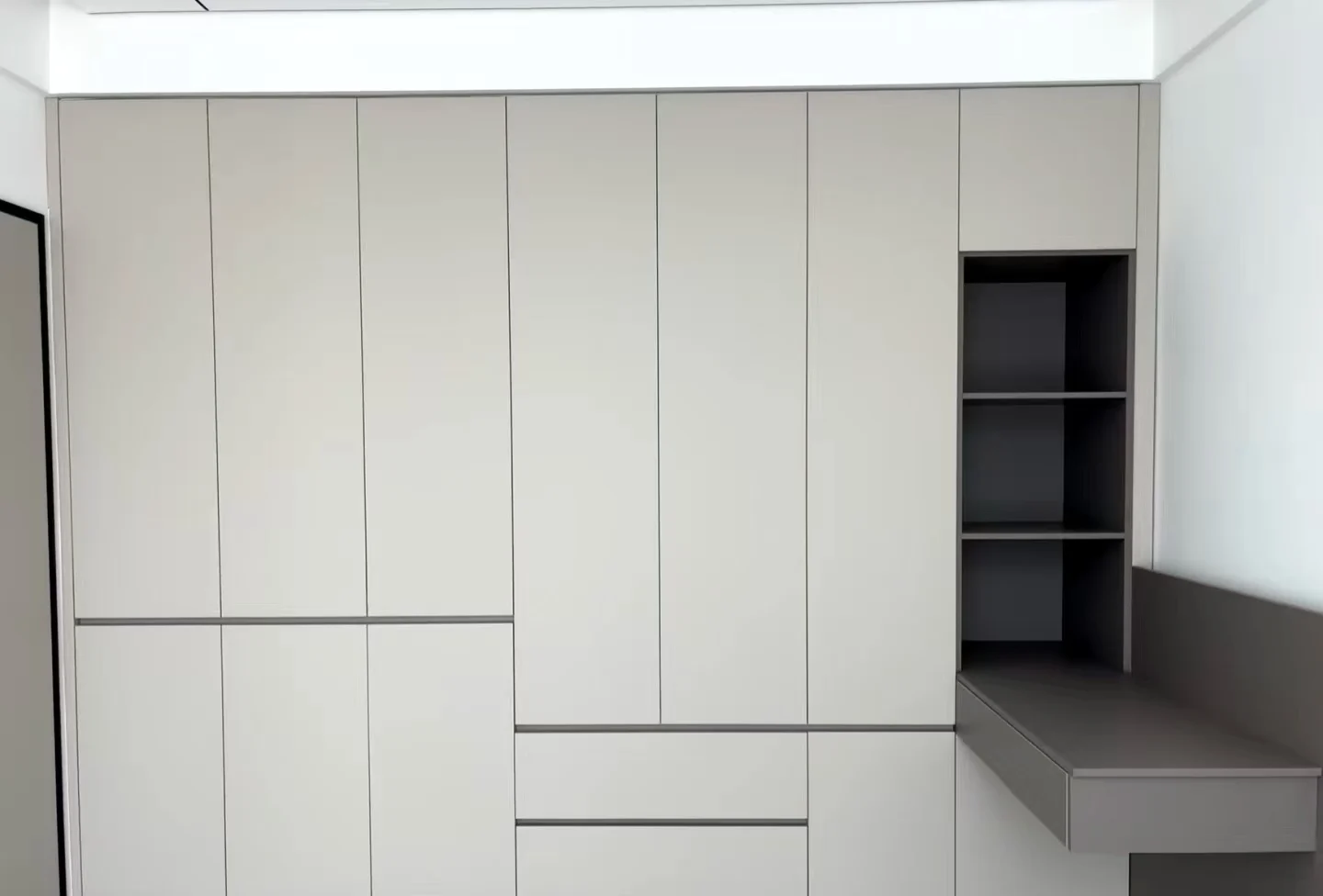 Modern Style Wardrobe From a Production Manufacturer Featuring Drawers With Handle-less Design