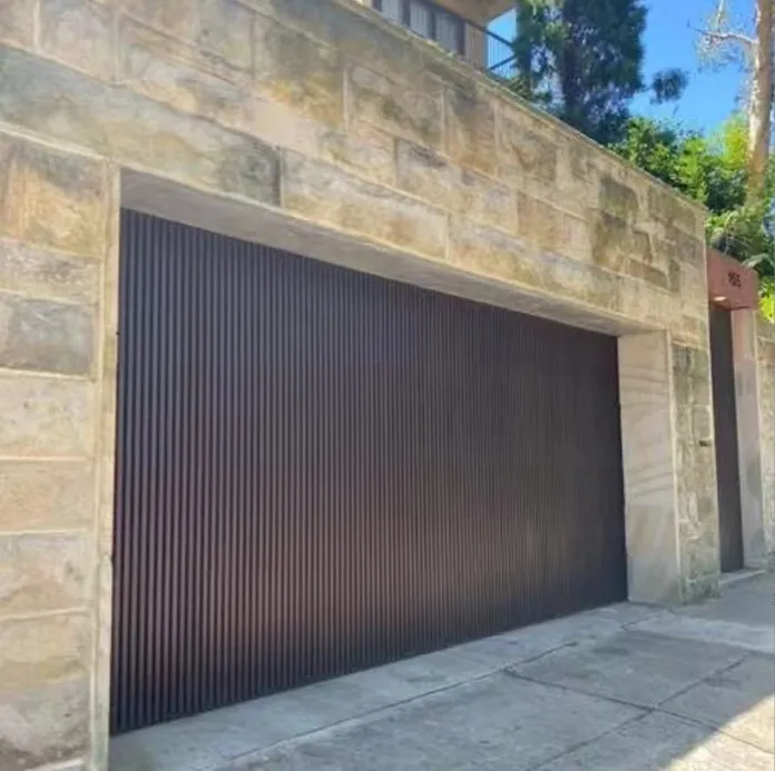 Prima  aluminum frameless non transparent electric lifting garage door factory in Guangdong China